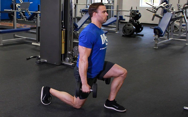 Walking lunges using dumbbells.