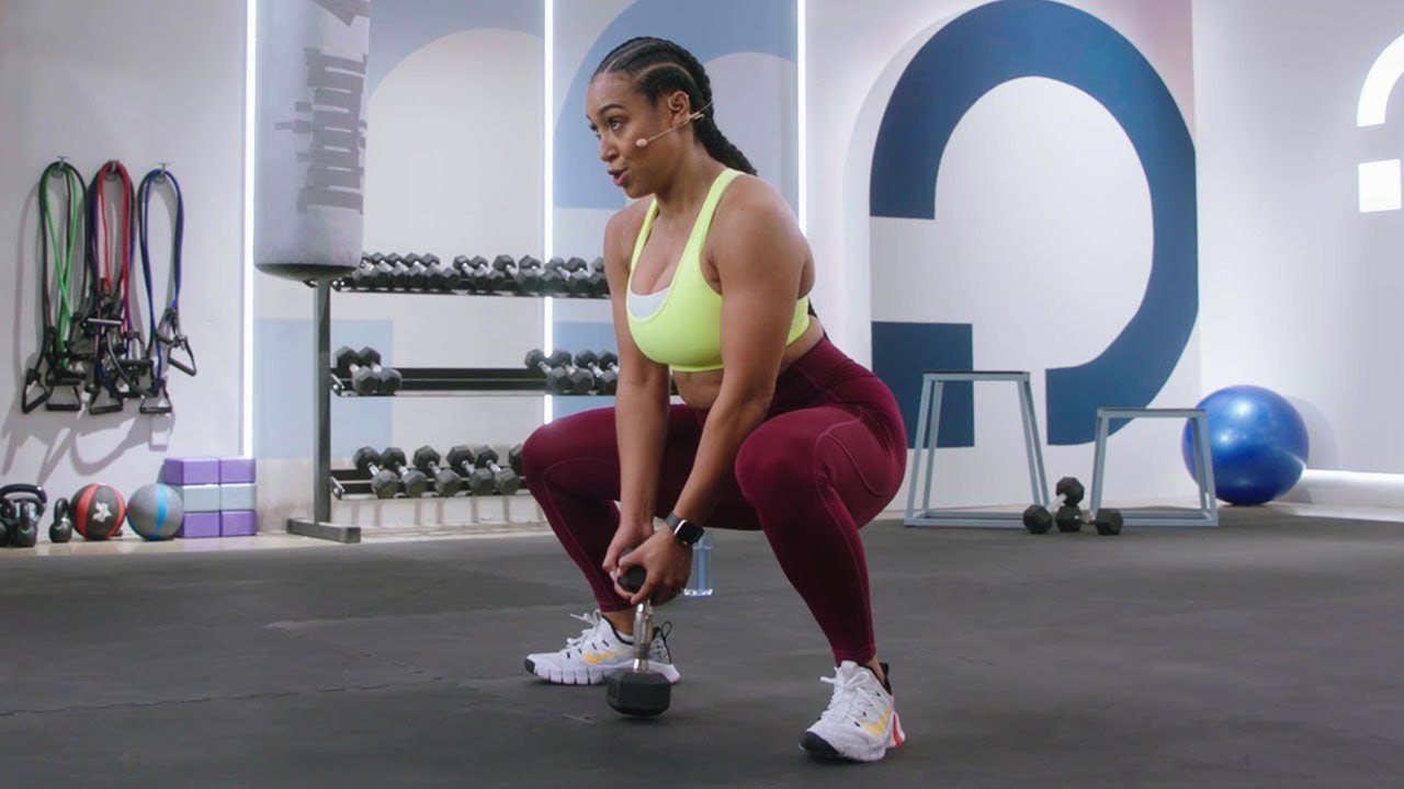 Wide-stance dumbbell sumo squat.