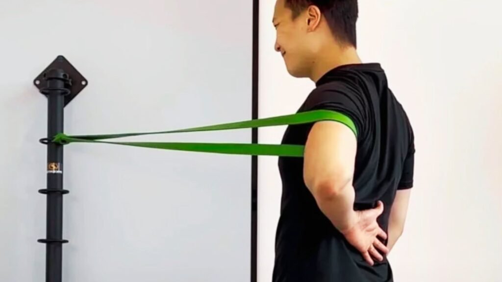 image of a man doing exercise for shoulder retraction.